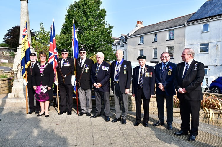 Representatives line-up at the War Memorial in Torpoint