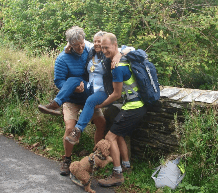 Former Saltash mayor Cllr Julia Peggs being bounced on the first stone during last year's Beating of the Bounds