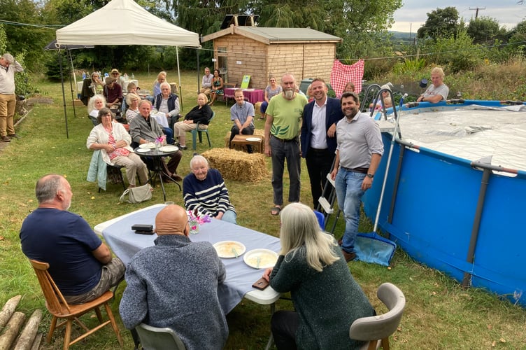 Standing by the  pool (left to right): Adam Sturtridge, Chair South East Cornwall Liberal Democrats, Ben Maguire, MP for North Cornwall and Leigh Frost, Leader of Cornwall Council