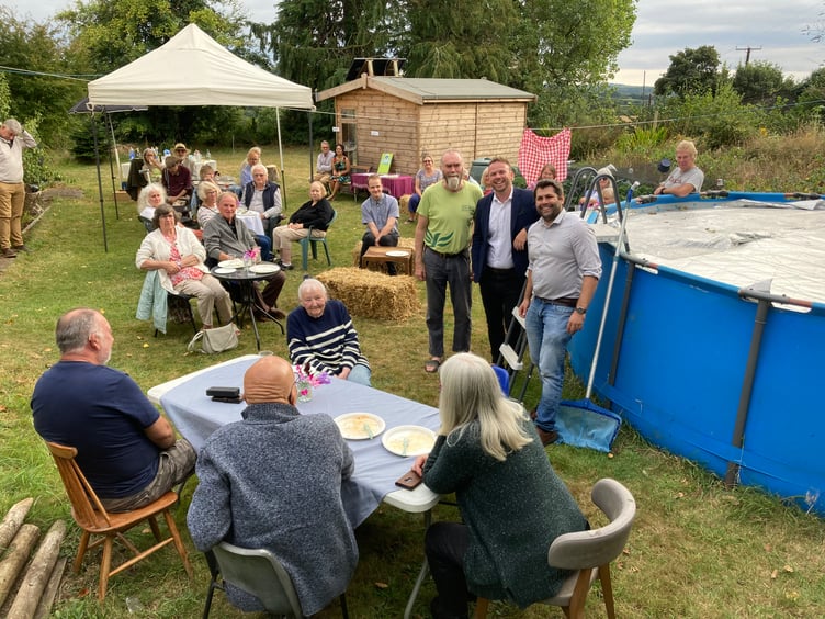Standing by the pool (left to right): Adam Sturtridge, Chair South East Cornwall Liberal Democrats, Ben Maguire, MP for North Cornwall and Leigh Frost, Leader of Cornwall Council