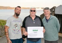 Local darts players hit the bullseye for cancer charity