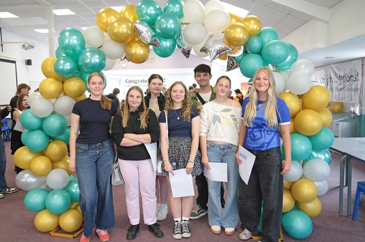 Students at Saltash Community College are all smiles after picking up their GCSE results on Thursday 