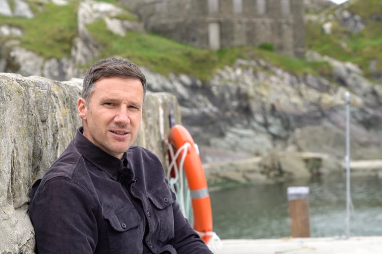 Missing Pieces Project Officer, Gareth Powell, explores Polperro. (Picture: Historic England Archive)