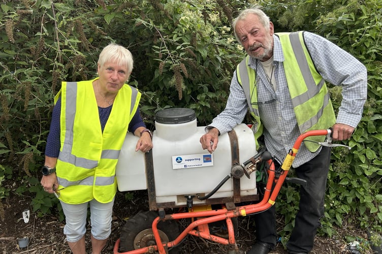 Liskeard Mayor, Cllr Christina Whitty pictured alongside John Crumpton from Liskeard in Bloom with the gifted water bowser