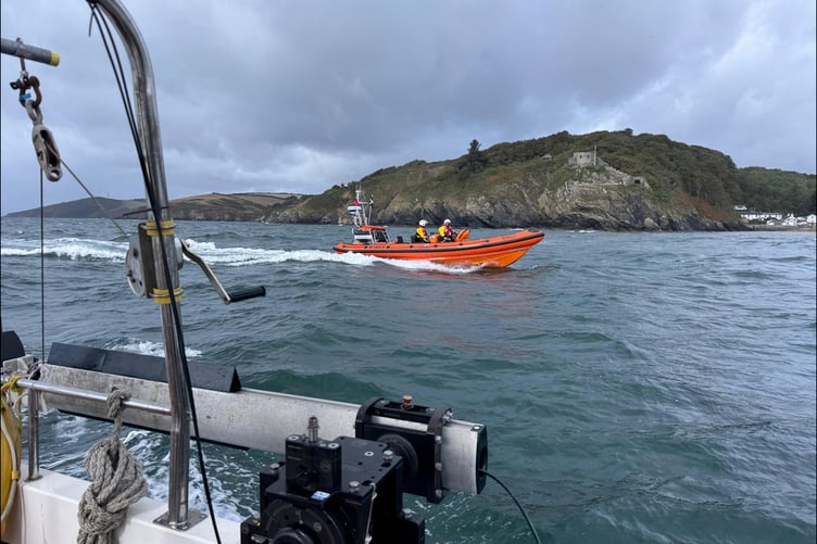 The Fowey Atlantic 85 lifeboat escorting the survey boat to safety. (Picture: Fowey RNLI)