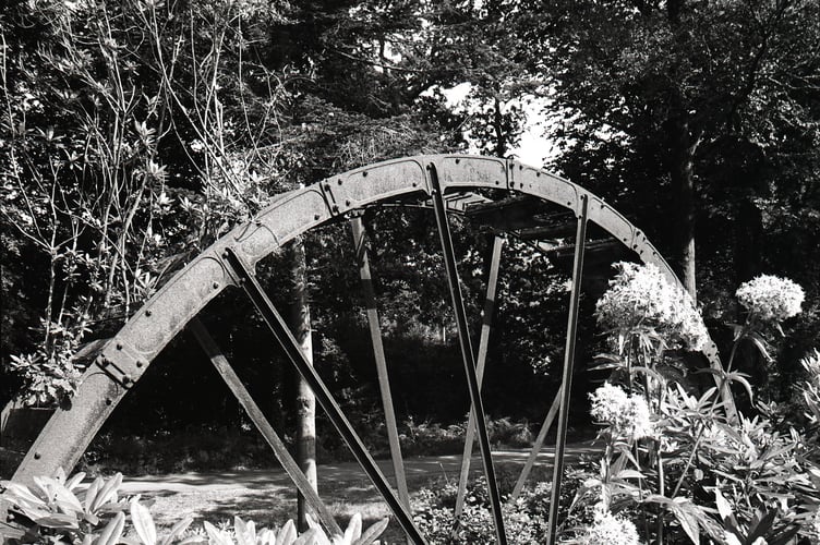 A 35ft waterwheel restored to working order can be seen at Wheal Martyn.