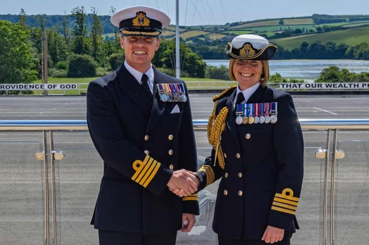 HMS Raleigh's new Commanding Officer, Captain Jeremy Ussher alongside Captain Jane Roe, who has held the post for the past three years