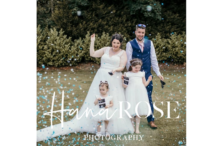 Sean and Chelsea with their two children on their wedding day announcing the gender of their baby due to be born this month.