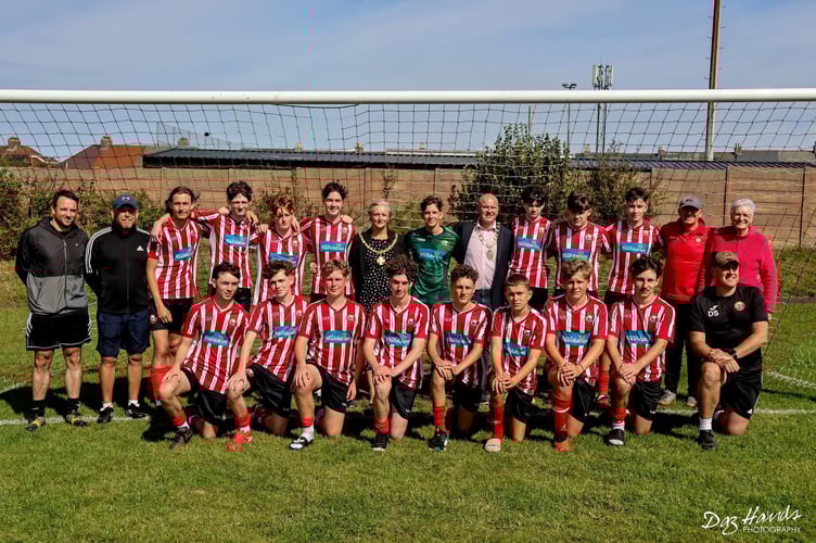 Saltash Town Mayor, Cllr Rachel Bullock pictured with members of the Saltash United Juniors section at the unveiling of the new goalposts at Warfelton Field (Picture: Daz Hands Photography)