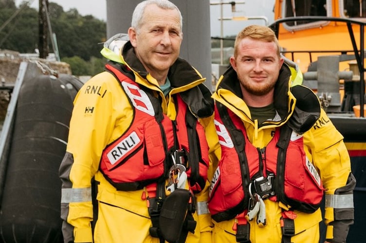 Jonathan Pitchard with his son, Callum, a lifeboat crew member. (Picture: Fowey RNLI)