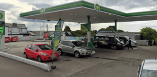 Man who climbed onto roof of petrol station arrested