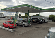 Man who climbed onto roof of petrol station arrested