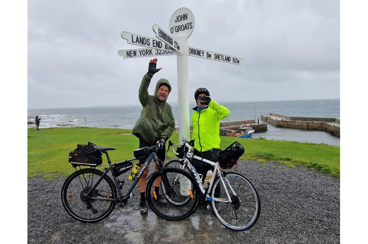 Roger Quaintance and Andy Guest cycled from Land's End to John O'Groats in 18 days for three charities