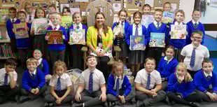 Author inspires schoolchildren – and picks up ideas for new book