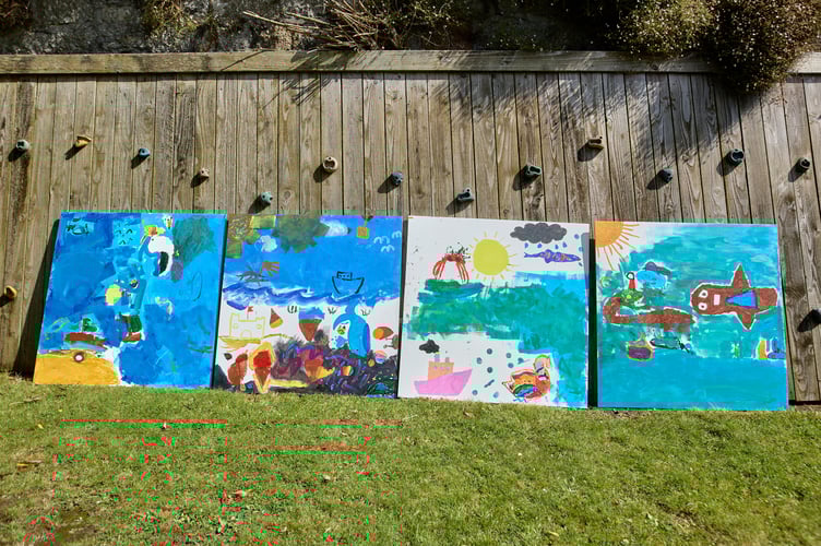 Flood defence holdings painted by students from Mousehole Primary School.