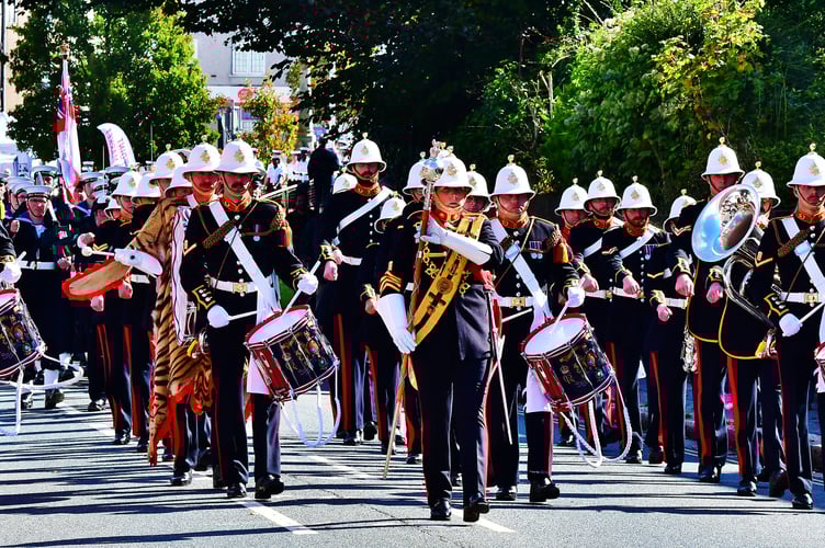 The Band of His Majesty’s Royal Marines Lympstone take to the streets of Torpoint