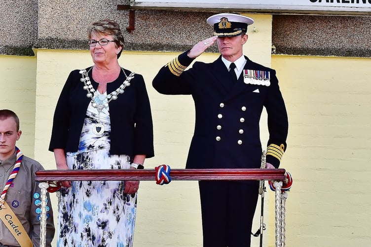 Torpoint Mayor, Cllr Julie Martin and HMS Raleigh Commanding Officer, Captain Jeremy Ussher oversee the traditional parade