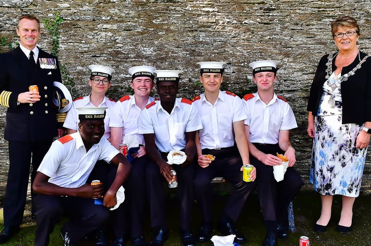 Captain Jeremy Ussher, Commanding Officer of HMS Raleigh and Torpoint Mayor, Cllr Julie Martin alongside recruits from the training base