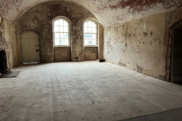 Room with the new suspended timber flooring with bat access in the corner (Picture: Crown Copyright)