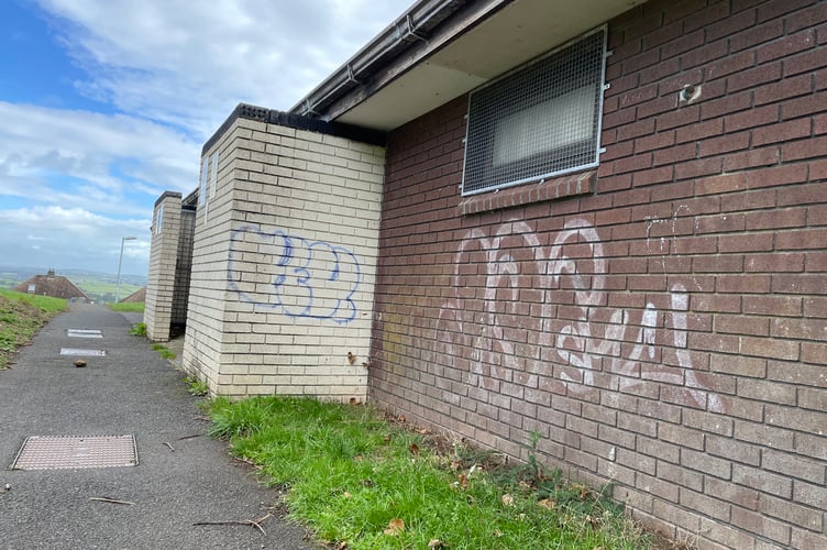 Graffiti on the walls of the toilets in Longstone Park in Saltash