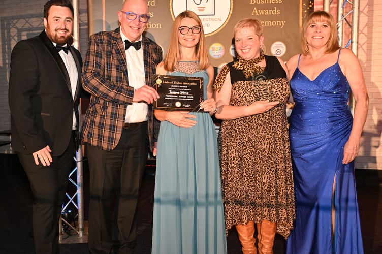 Alex Thom, Sarah Sobey and Michaela Leitson-Thom of Thompsons Opticians collecting the ‘Professional Services Award’