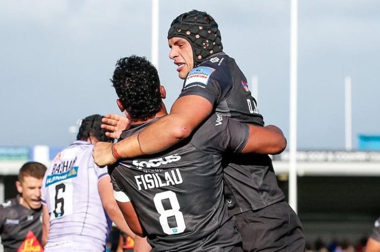 Exeter Chiefs duo Greg Fisilau and Dafydd Jenkins celebrate their side's victory over Gloucester (Picture: Exeter Chiefs)