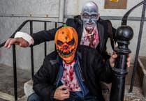 Zombies walk through St Austell streets in annual night of frights and fun