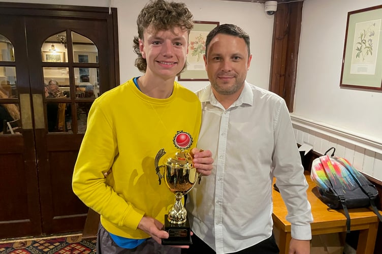 Saltash CC Young Player of the Year Josh Gue alongside club chairman Shayn Rencher