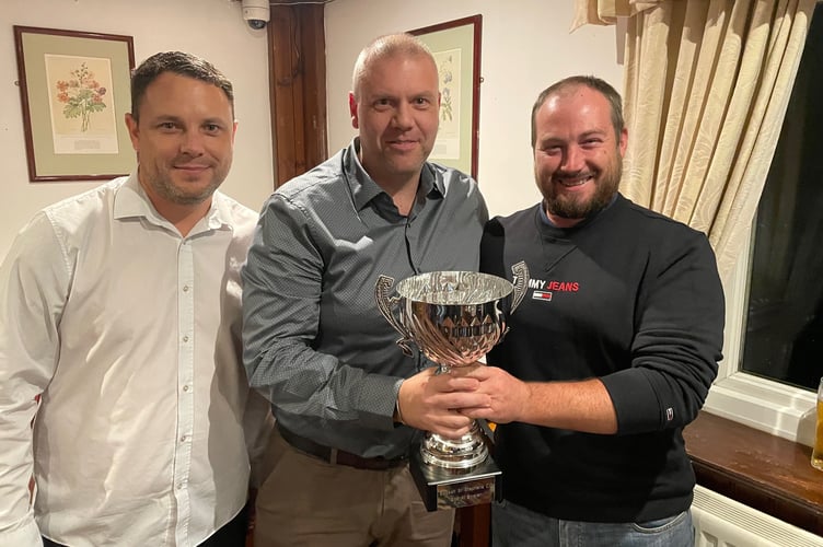 Jim Matthews (centre) receives the Saltash CC second team bowler of the year award from Shayn Rencher and Curtis Barlow