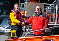 Looe RNLI volunteer earns helm qualification after intense sea trial
