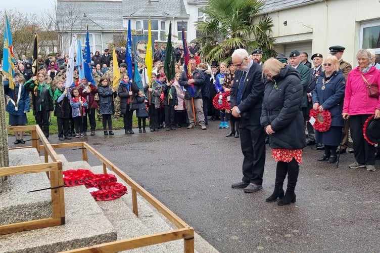 Cornwall councillors for Liskeard, Kevin Grey and Jane Pascoe, pay their respects on Sunday