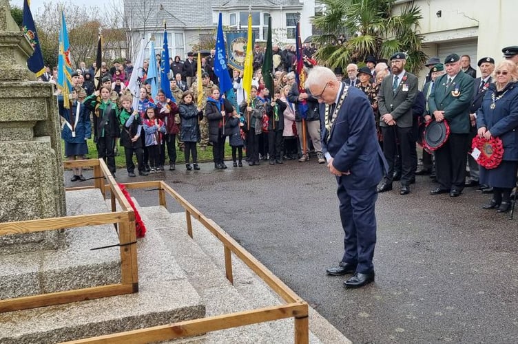 Liskeard deputy mayor, Cllr David Braithwaite, lays a wreath at the town's war memorial