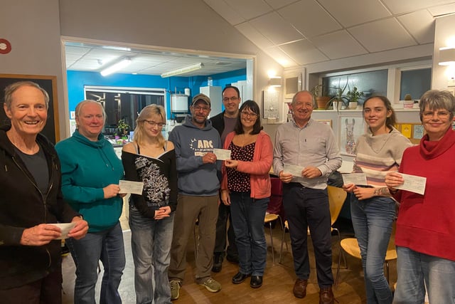 Youth groups celebrate funds raised by local running hero