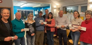 Youth groups celebrate funds raised by local running hero