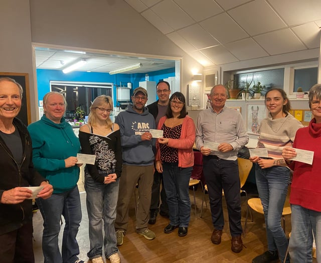 Youth groups celebrate funds raised by local running hero