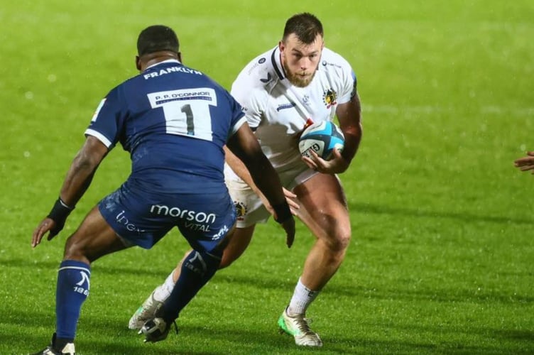 Exeter Chiefs prop Ethan Burger looks to find a way past Sale's Simon McIntyre during Friday night's Prem Cup encounter