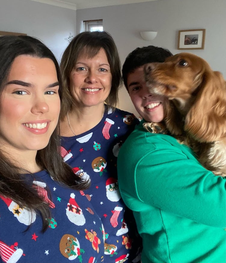 Jo Smith with her daughters Alicia (left) and Danielle, and their working cocker Boris