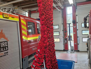 Community effort ensures knitted poppy tribute can be reused
