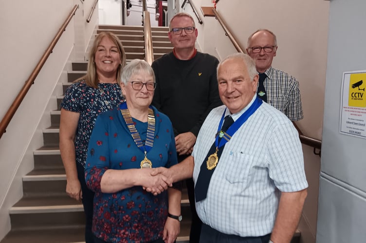 Pictured with the chairman Mr Colin Dymond are show secretary Mrs Beckie Breyley, show treasurer Mr Peter Hockin and show vice chairman Mr Phil Dymond congratulating the incoming president Mrs Marie Bersey.
