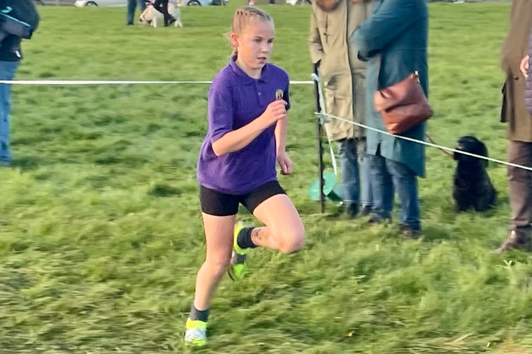 A determined Theia Jones from Bishop Cornish on her way to success in the Year 5/6 Girls race