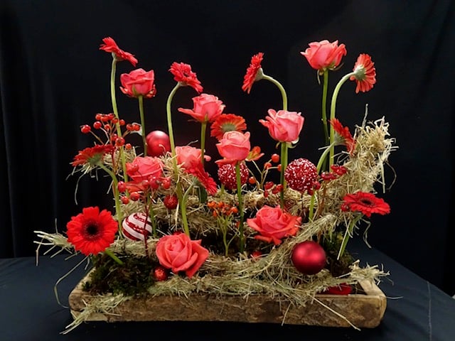 One of the arrangements created by Charlotte Dawe from Port Isaac in her demonstration to Liskeard Flower Club entitled "Christmas is Coming"