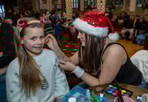 Town sparkles as community comes together for festive lights switch-on