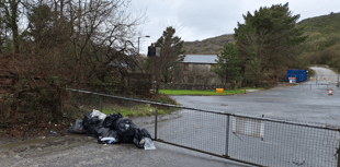 Woman ordered to pay more than £700 after dumping nine bags of rubbish