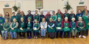 Star guest joins villagers to mark five years of community shop