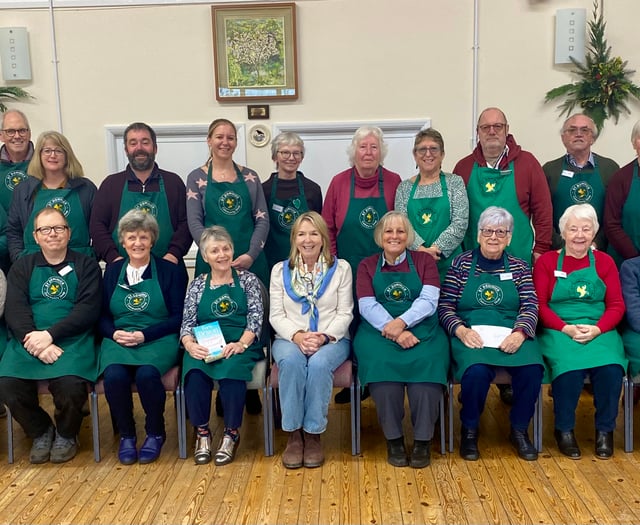 Star guest joins villagers to mark five years of community shop