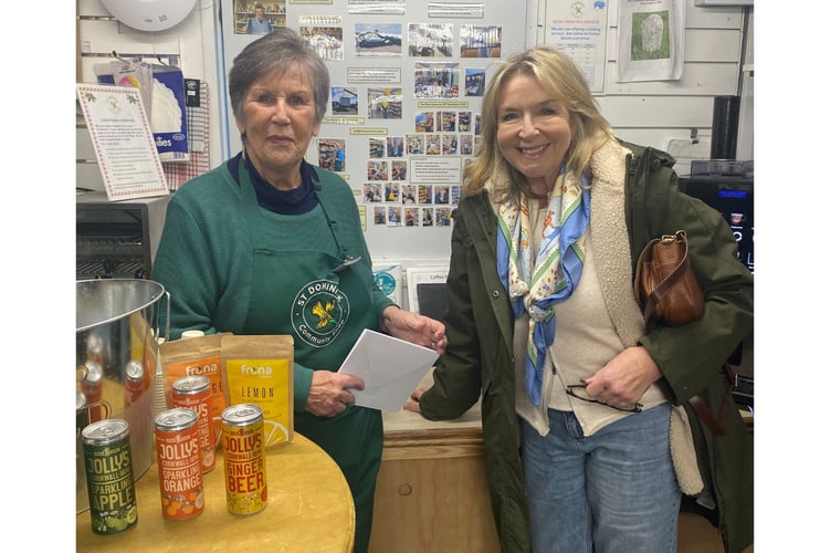 St Dominick Community Shop volunteer alongside Fern Britton, who was a former villager many years ago