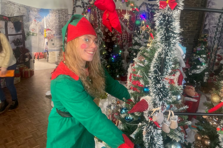 One of the Christmas elves hard at work in the Torpoint Christmas grotto