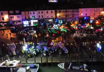 Looe transformed into a picture of colour by tractor parade