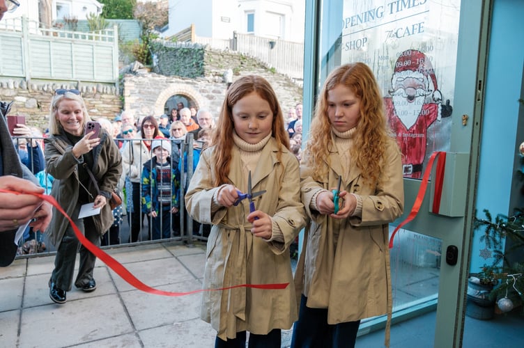 Sisters Scarlett and Harriet Hackley were given the honour of cutting the ribbon at the shop's official opening