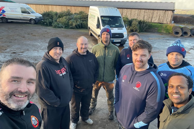 Members of the Saltash Cricket Club collected over 200 Christmas trees as part of a fundraising drive for the youth section